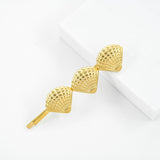 Golden shell hair pin