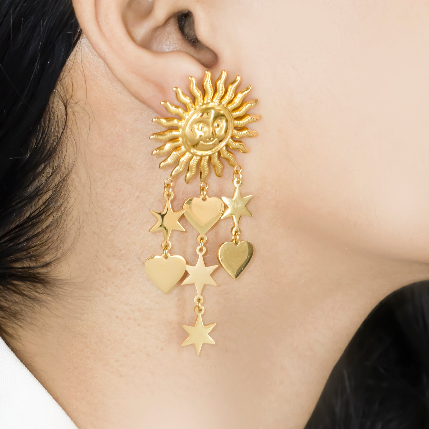Sun and star statement earrings