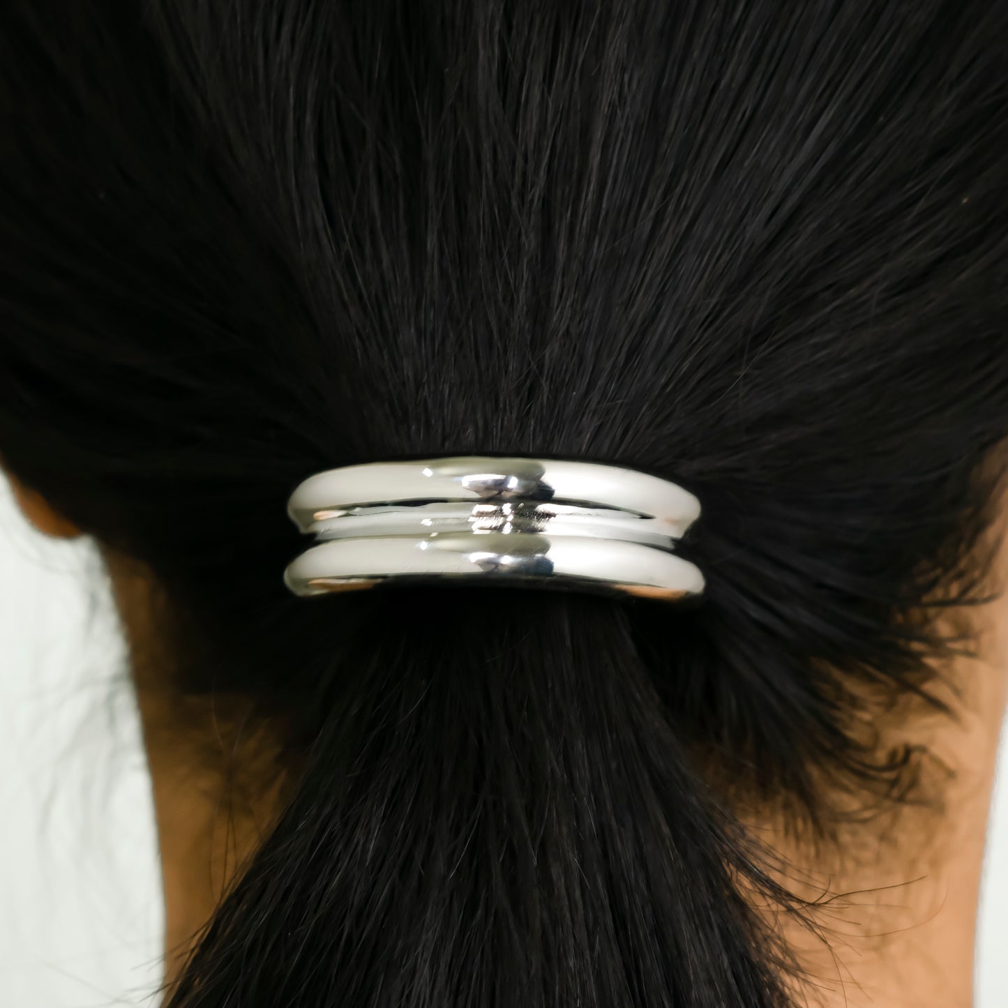 Double arc hair-tie