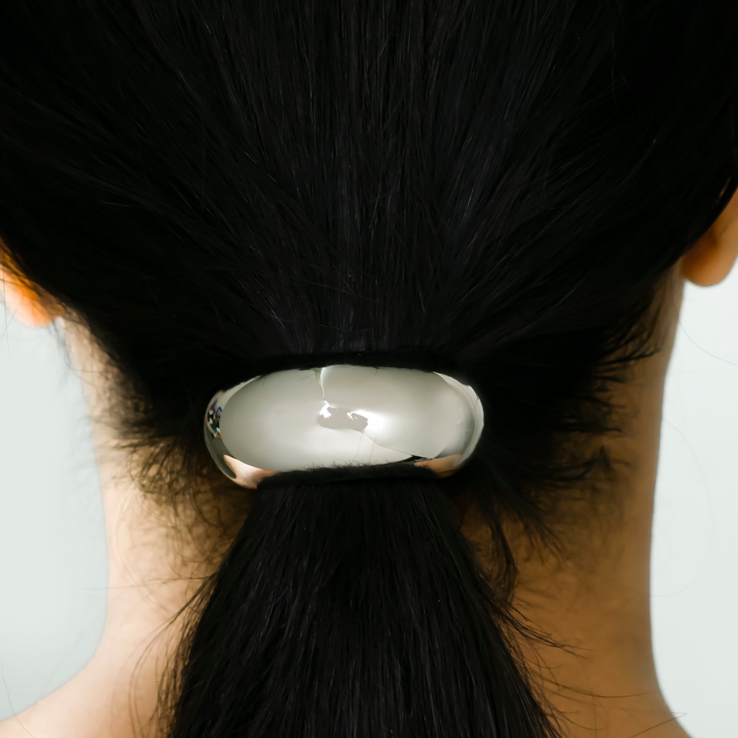 Silver arc hair-tie