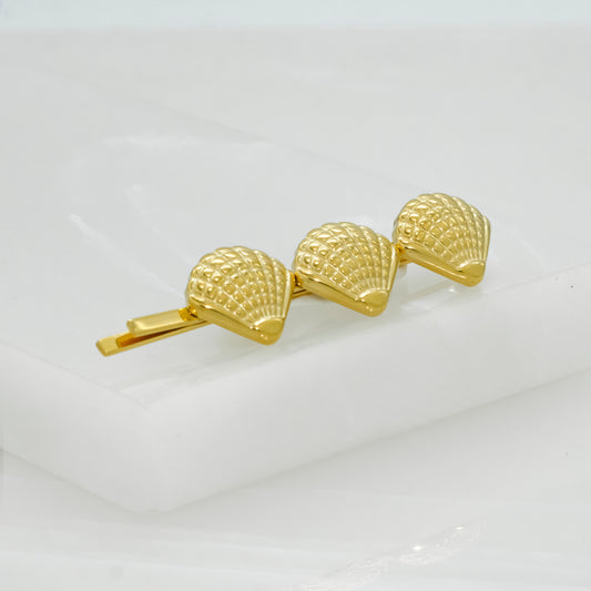 Golden shell hair pin