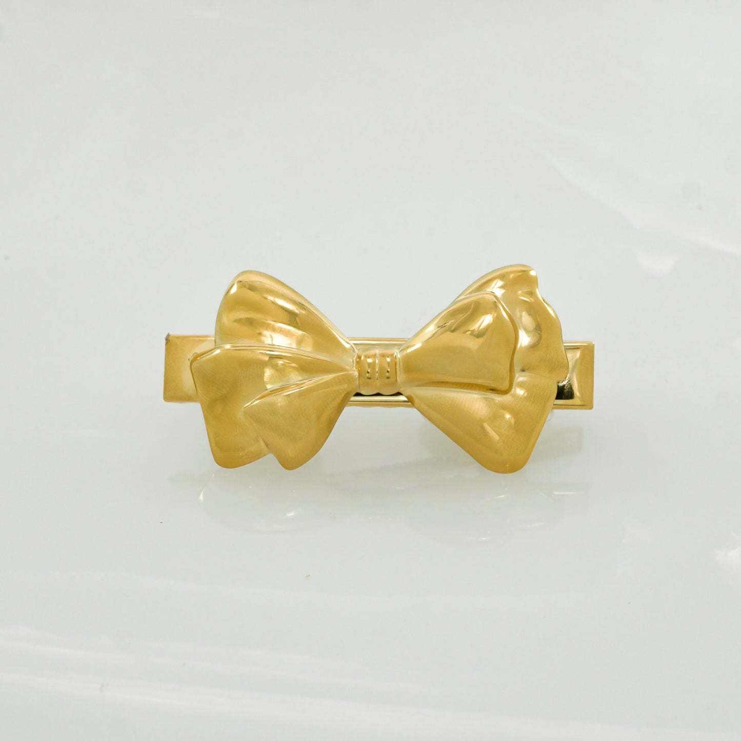 Golden bow hair clip
